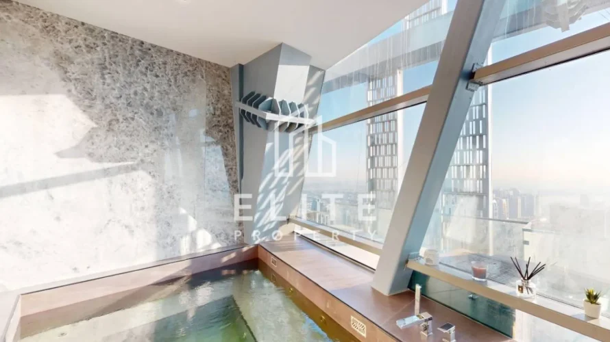Apartamento de 4 dormitorios en Cayan Tower, UAE No. 1852 № 1